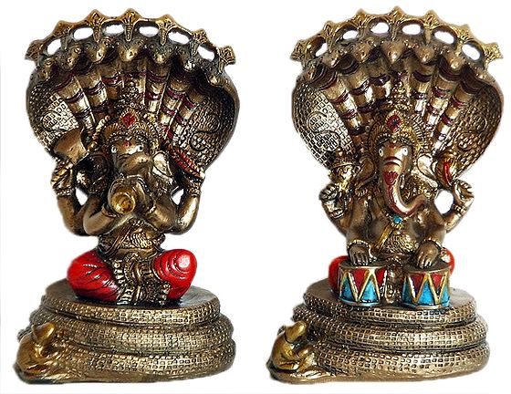 a-pair-of-musician-ganesha-sitting-under-serpent-hood